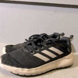 Boys sneakers used but still have life left in them .